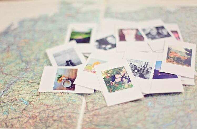 polaroid-photos-on-map.jpg